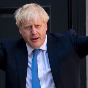 british-pm-johnson-set-to-lift-covid-rules-as-omicron-peaks
